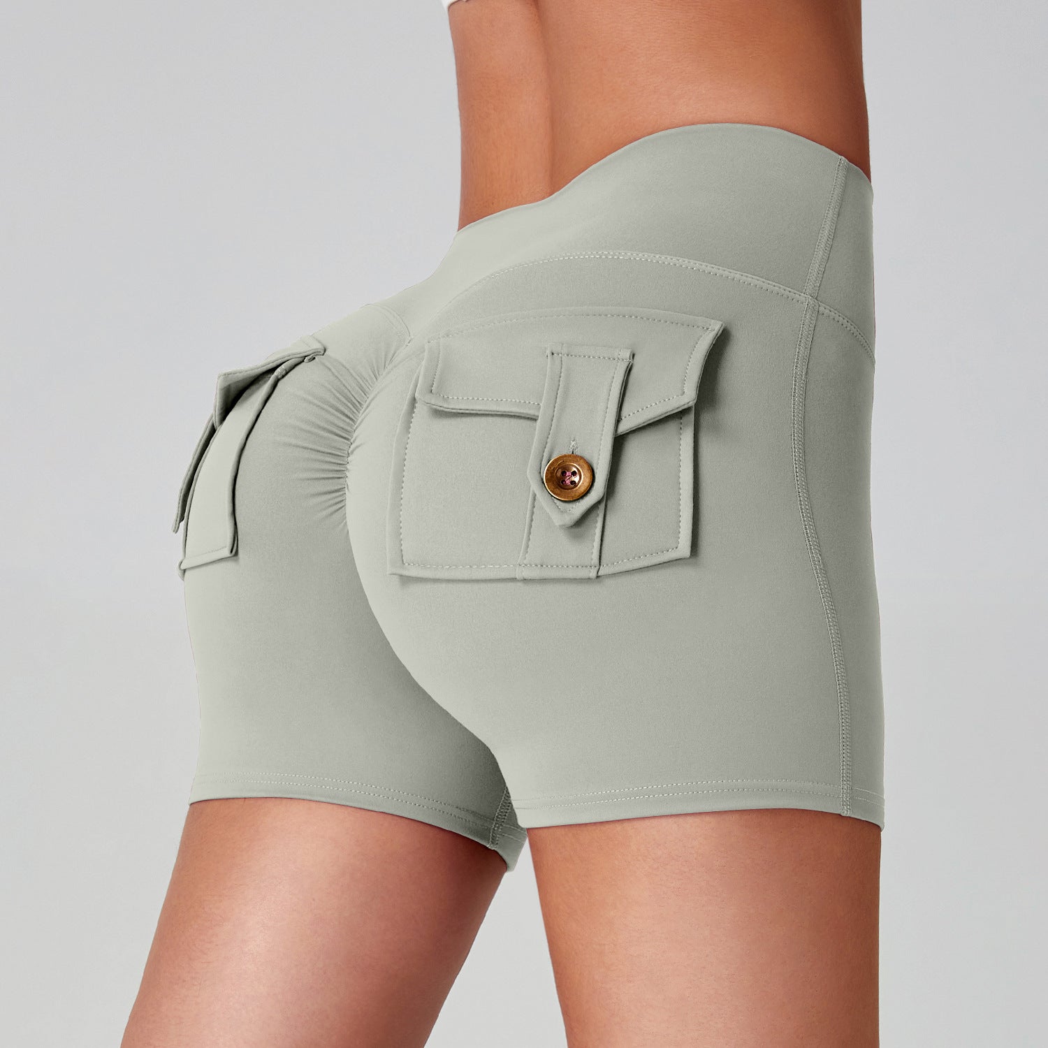 Women quick dry running leggings in light green with pocket detail, showcasing high stretch comfort and a stylish fit.